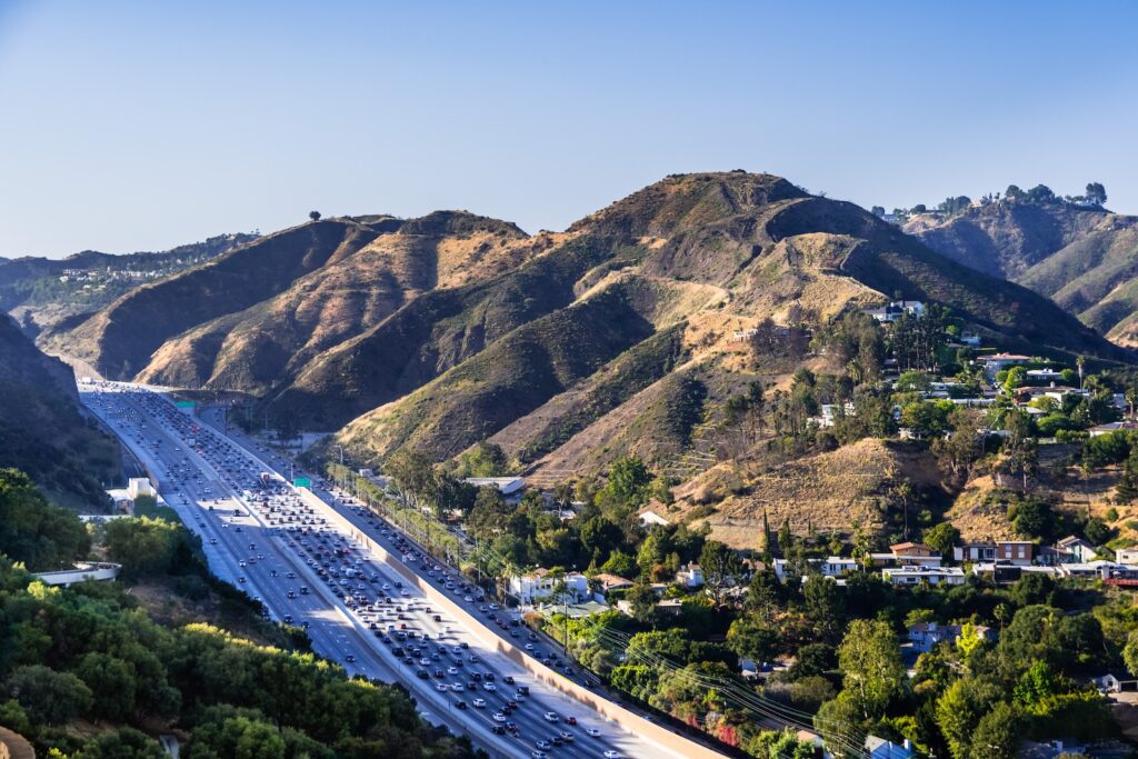 Aerial view of highway 405 highway with residential homes in the background, Los Angeles, California